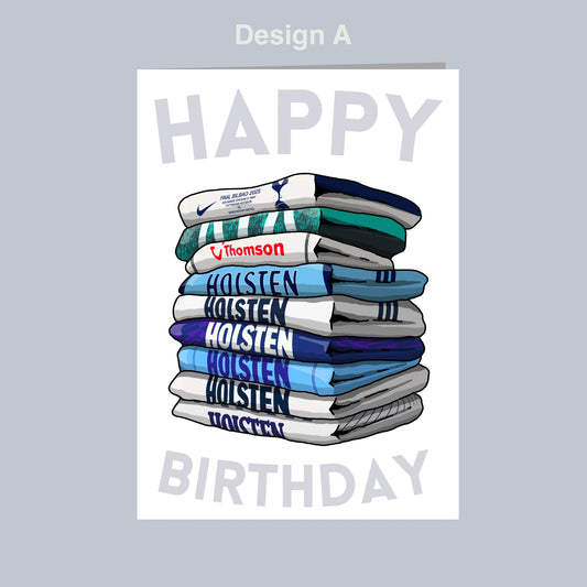 A stack of various colored shirts, with the text "Happy Birthday" written on them.