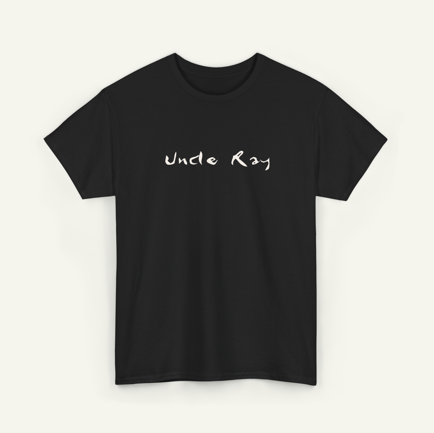 A black t-shirt with the text "Uncle Ray" printed on it in white.