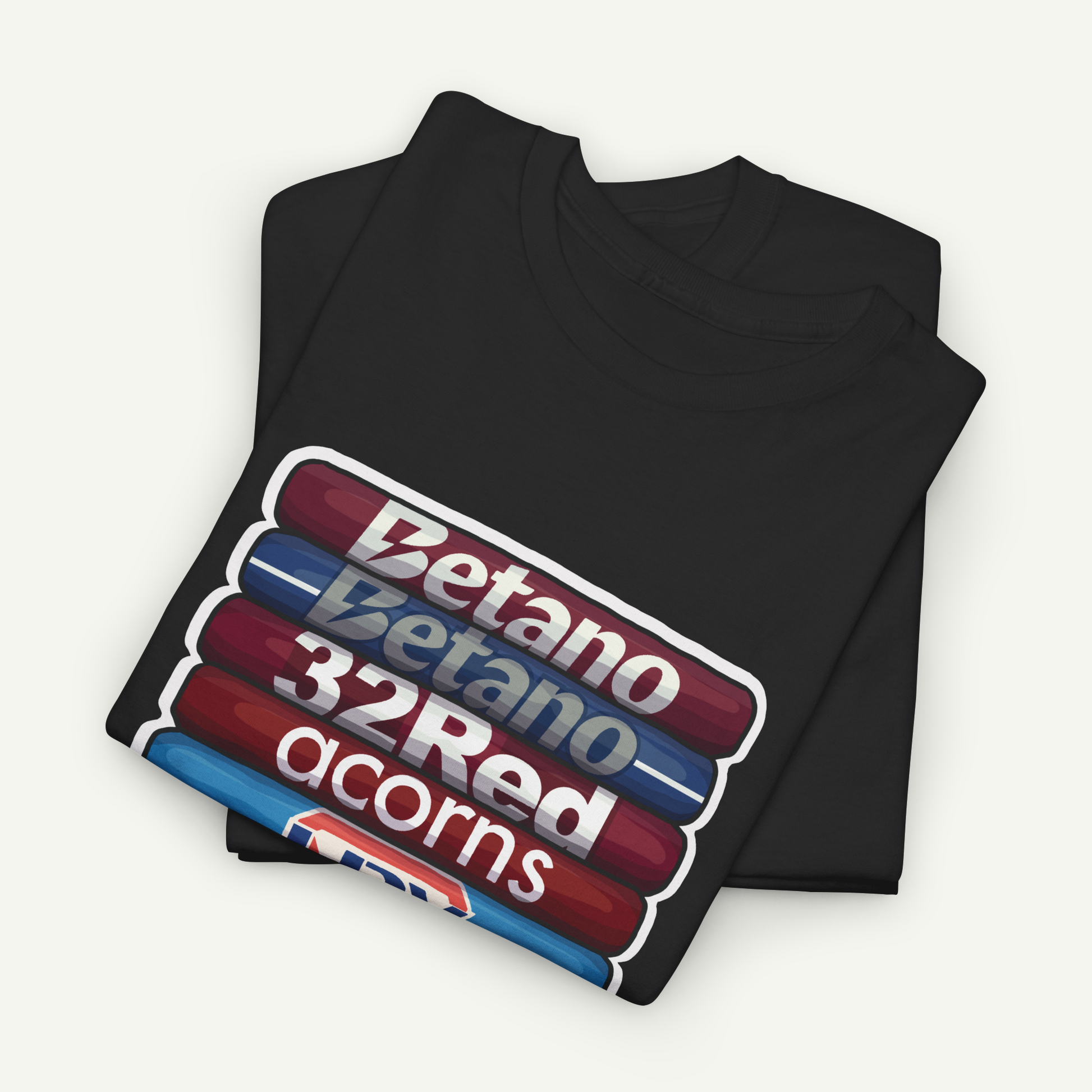 A black t-shirt with a graphic design featuring a stack of colored pencils with the text "Betano 32Red acorns" printed on it.