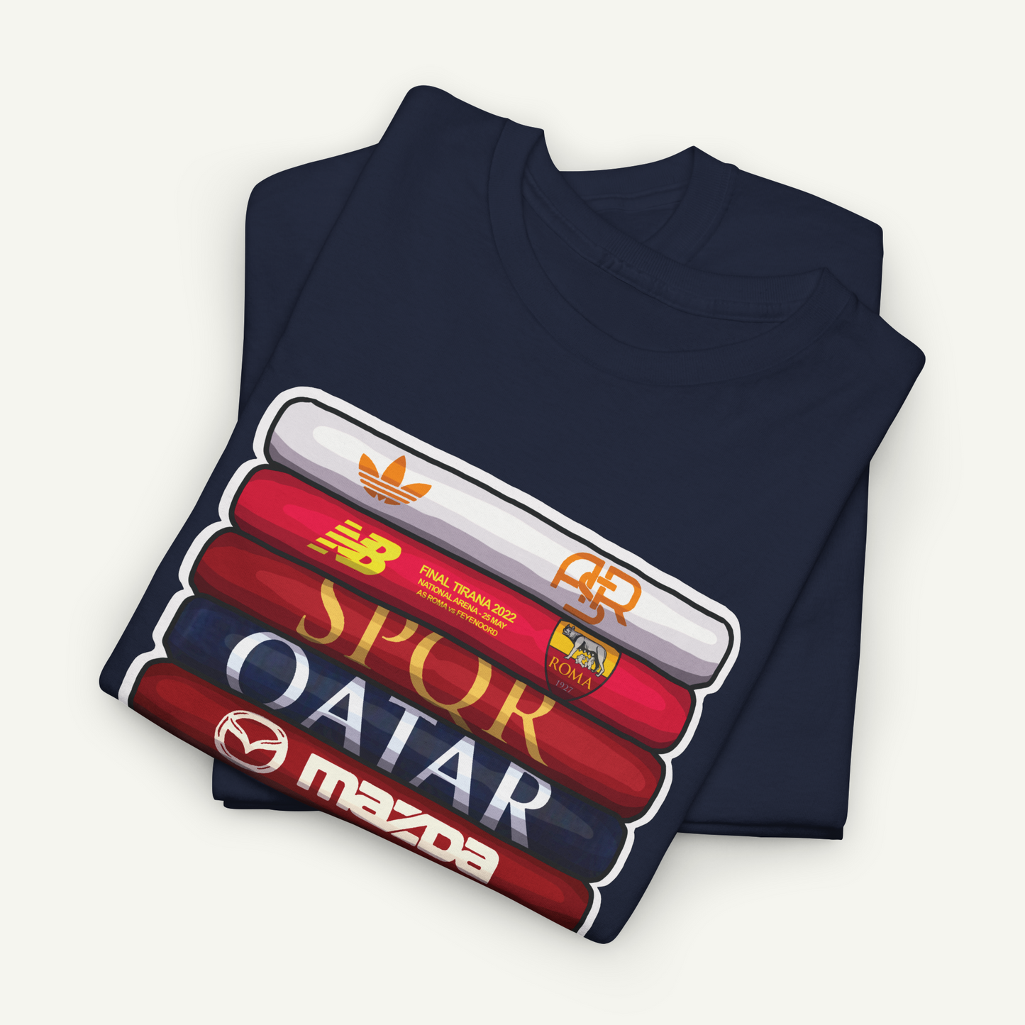 A navy blue t-shirt with a graphic design featuring a stack of colorful tubes with various logos, including Adidas, B&B, SPORQ, QATAR, and Mazda.