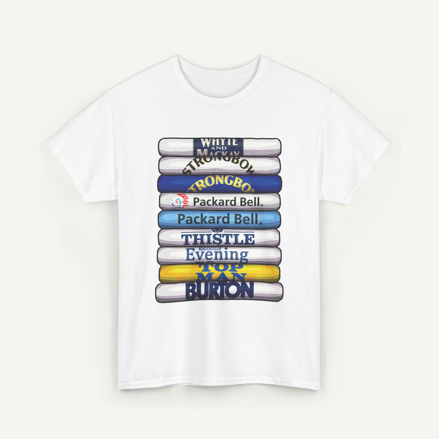 A white t-shirt with a graphic design featuring a stack of colorful books or book-like objects, each with a different title written on it.