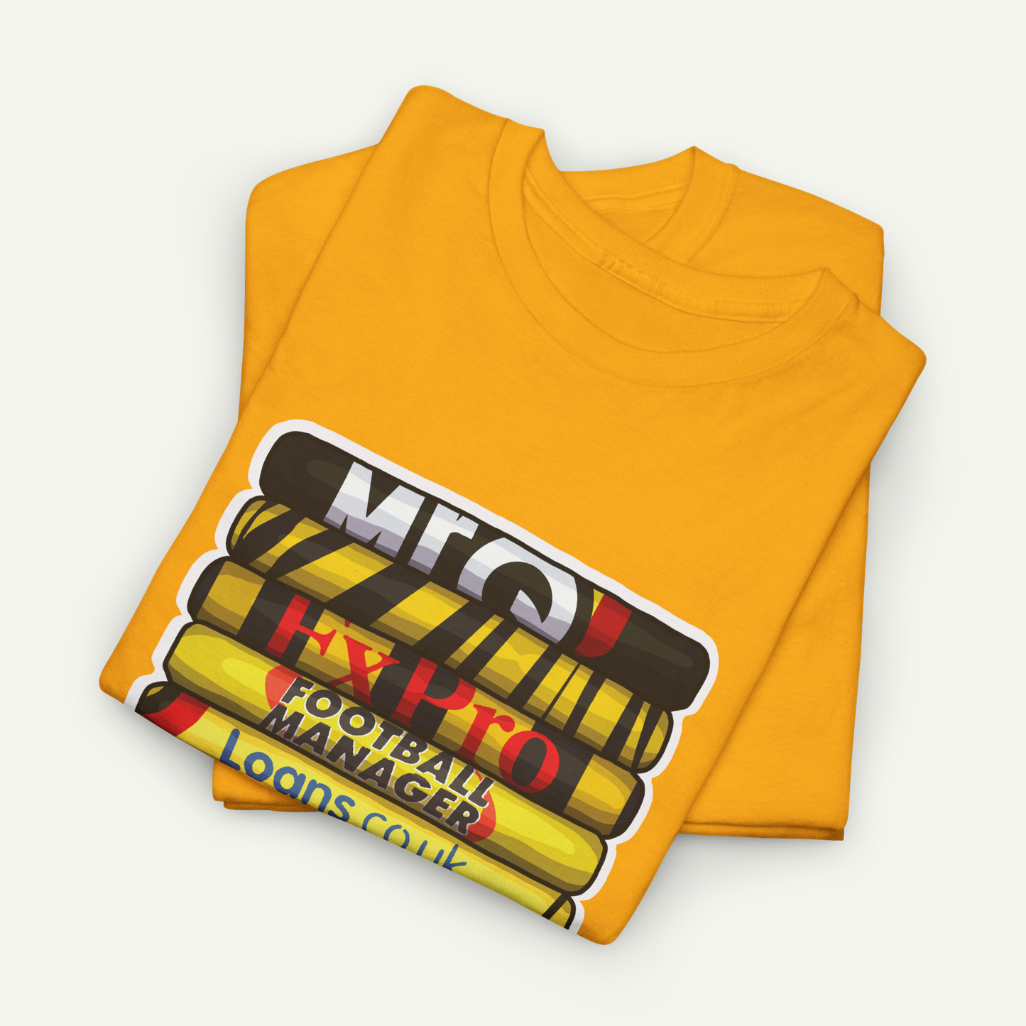 A yellow t-shirt with a graphic design featuring a stack of books or blocks with the text "M.C. Escher" printed on them.