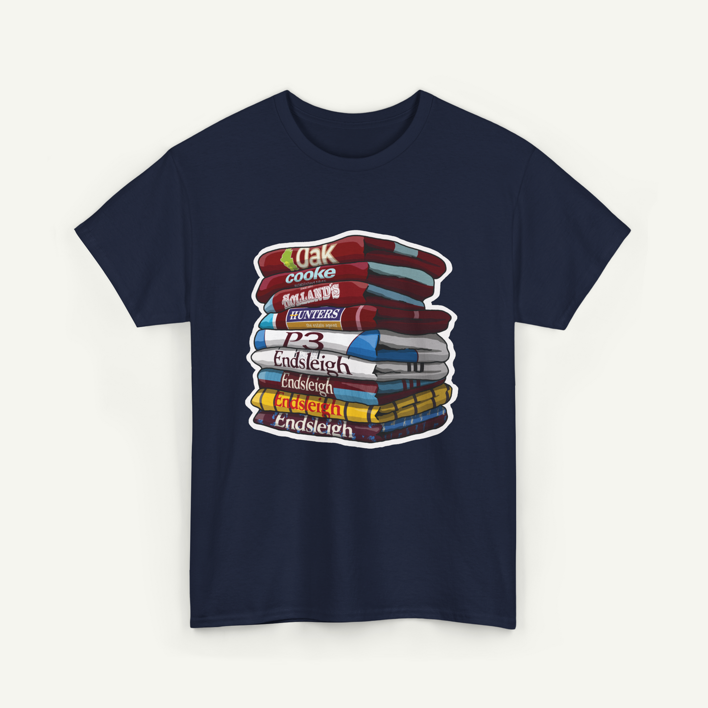 A navy blue t-shirt with a graphic design depicting a stack of colorful books.