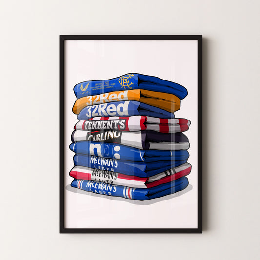A framed illustration of a stack of various colored towels or blankets, each with text or logos printed on them.