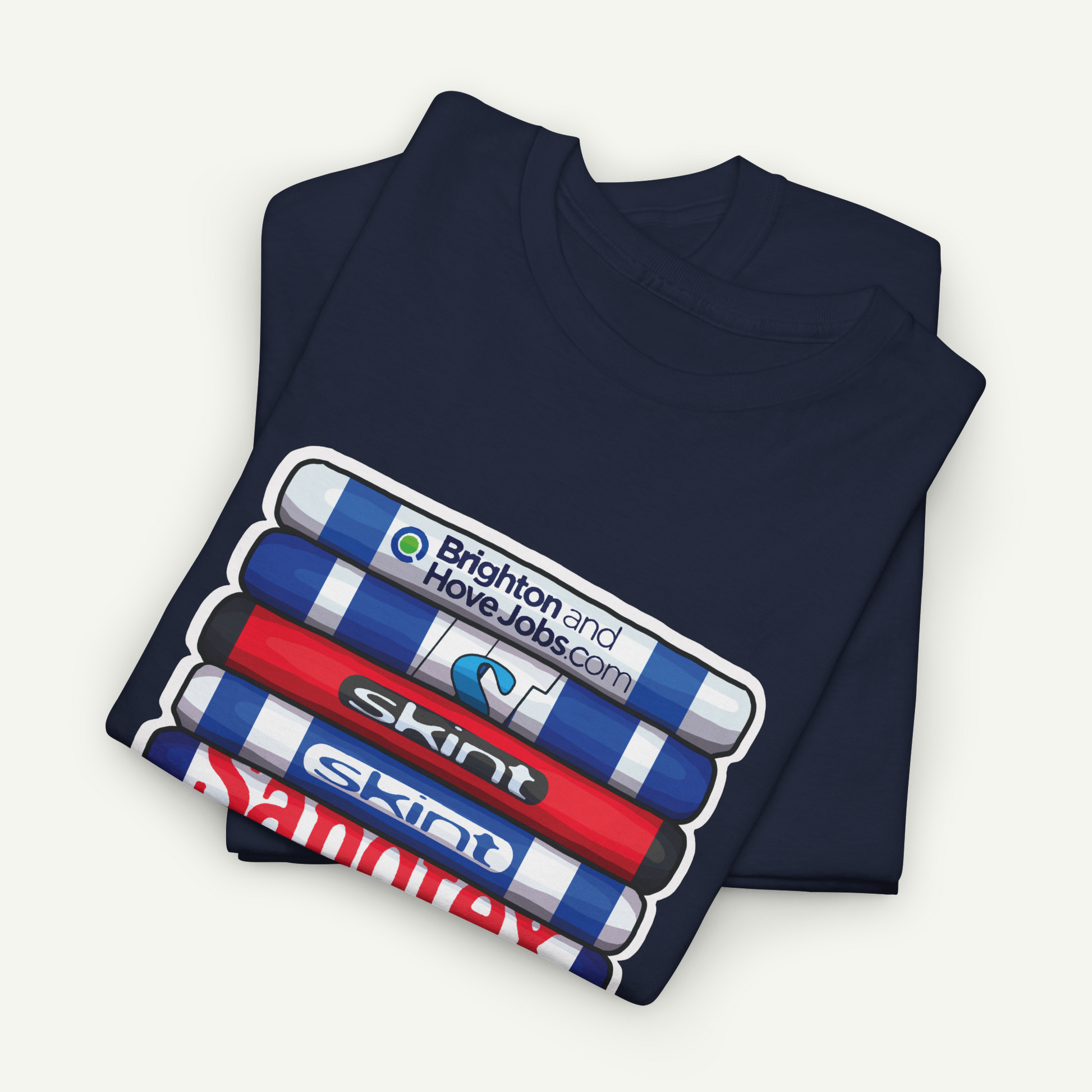 A dark blue t-shirt with a graphic design featuring a stack of colorful markers or highlighters.