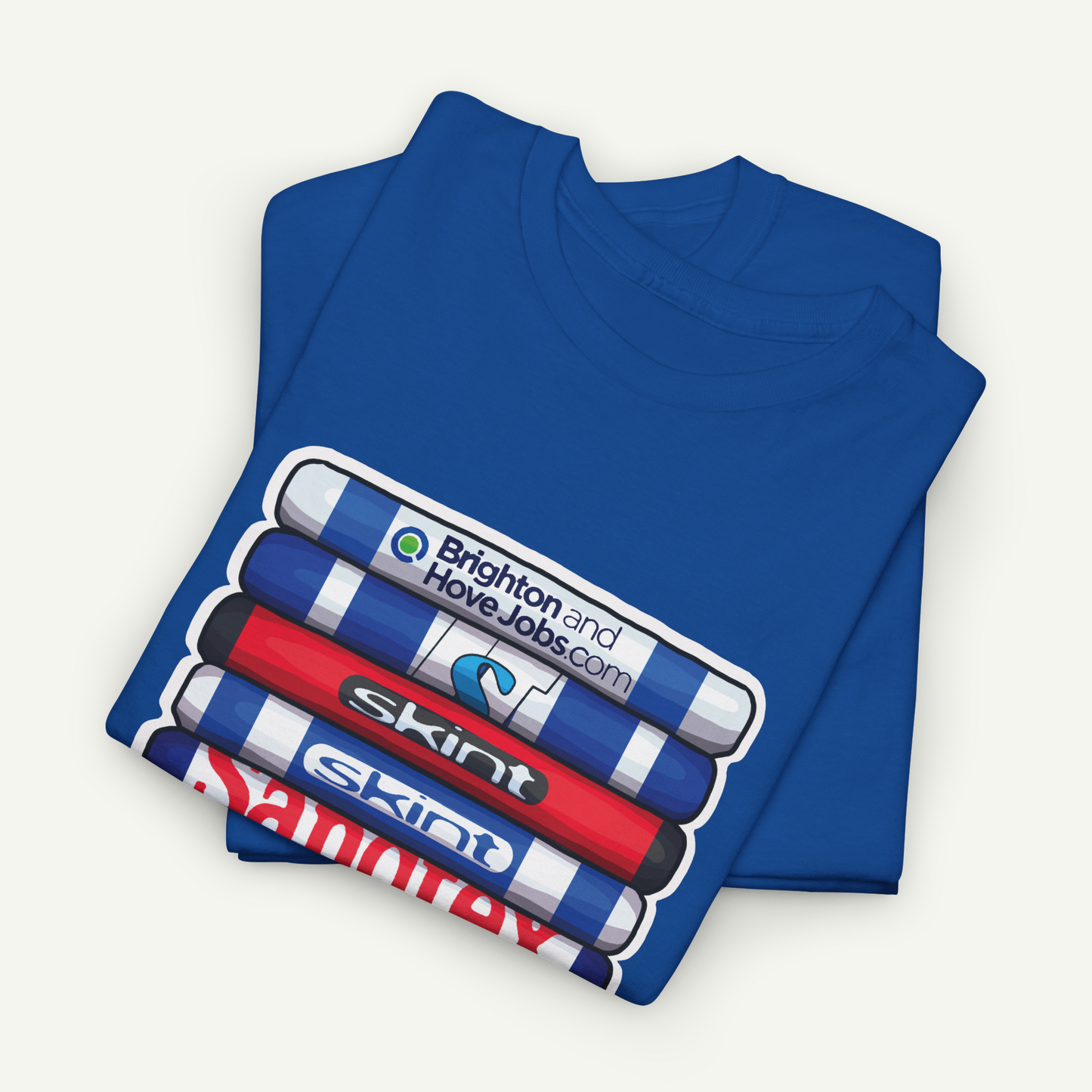 A blue t-shirt with a graphic design featuring a stack of colorful markers or highlighters.