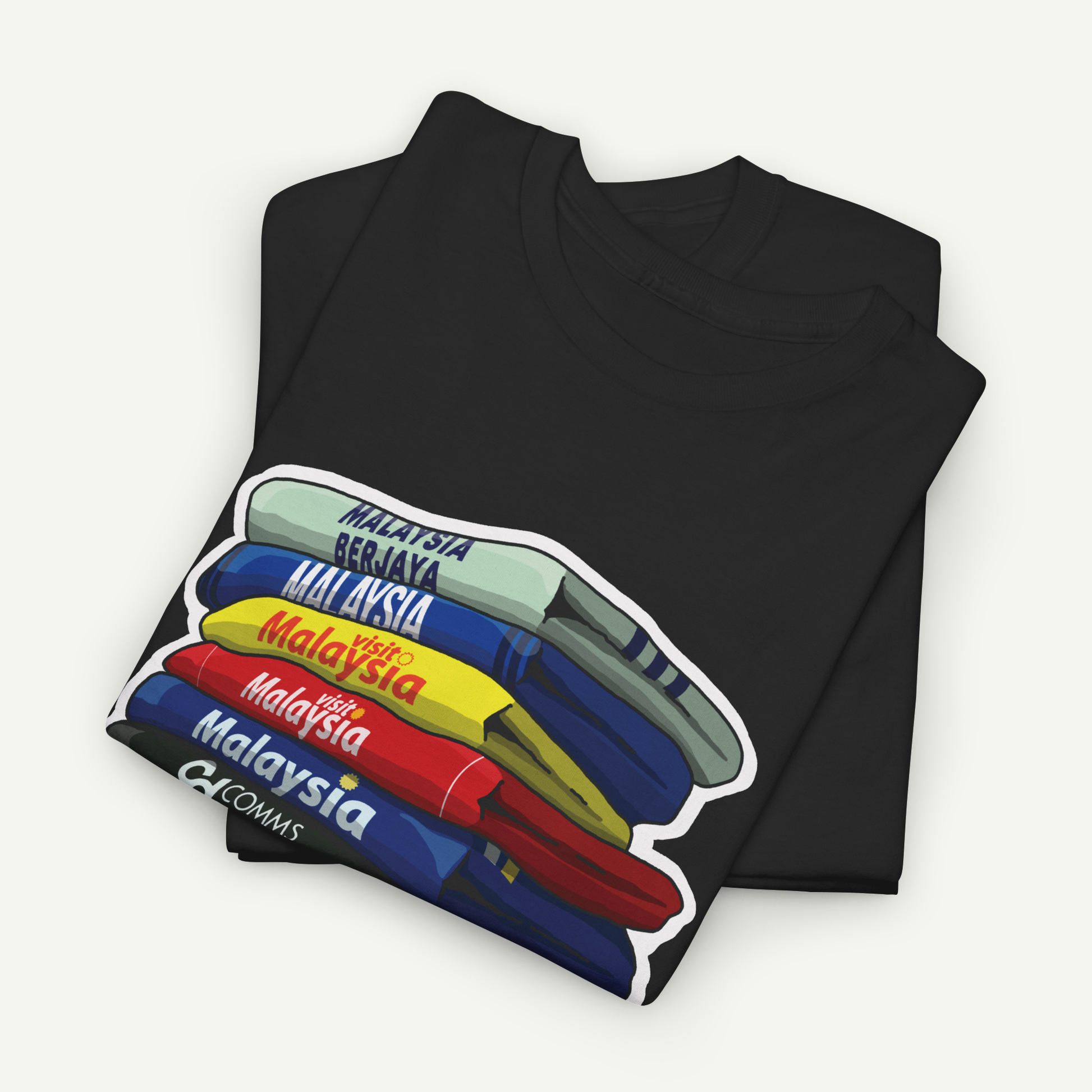 A black t-shirt with a colorful graphic design depicting the countries of Malaysia stacked on top of each other.