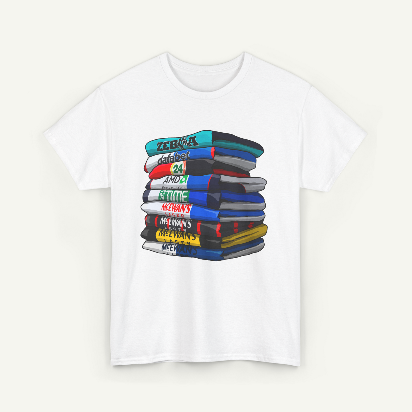 A white t-shirt with a colorful graphic design depicting a stack of books with various colored spines.