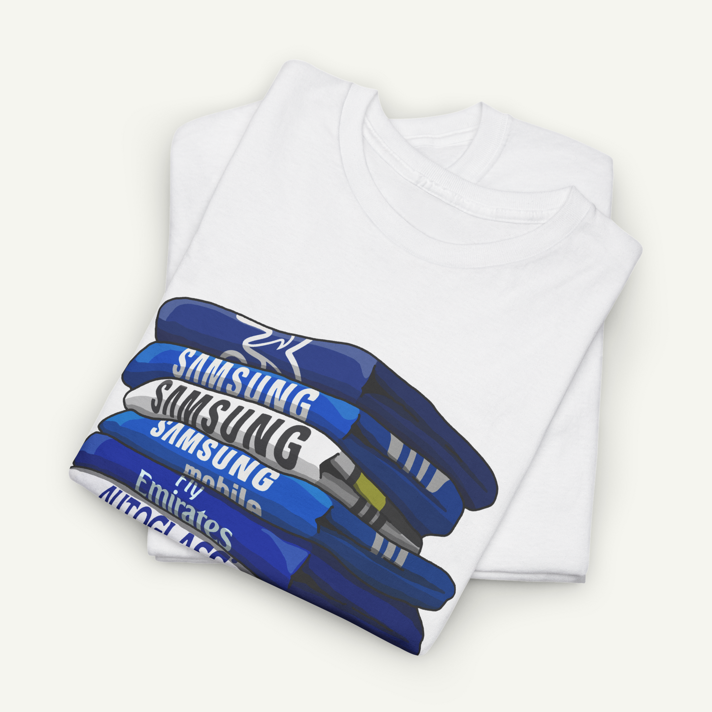 A white t-shirt with a graphic design depicting a stack of blue and white Samsung products.