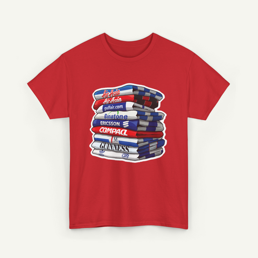 A red t-shirt with a graphic design depicting a stack of books or magazines with various text elements on them.
