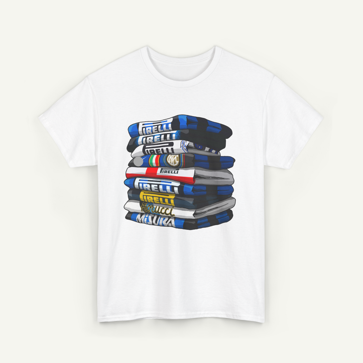 A white t-shirt with a graphic design depicting a stack of various colored books or magazines.