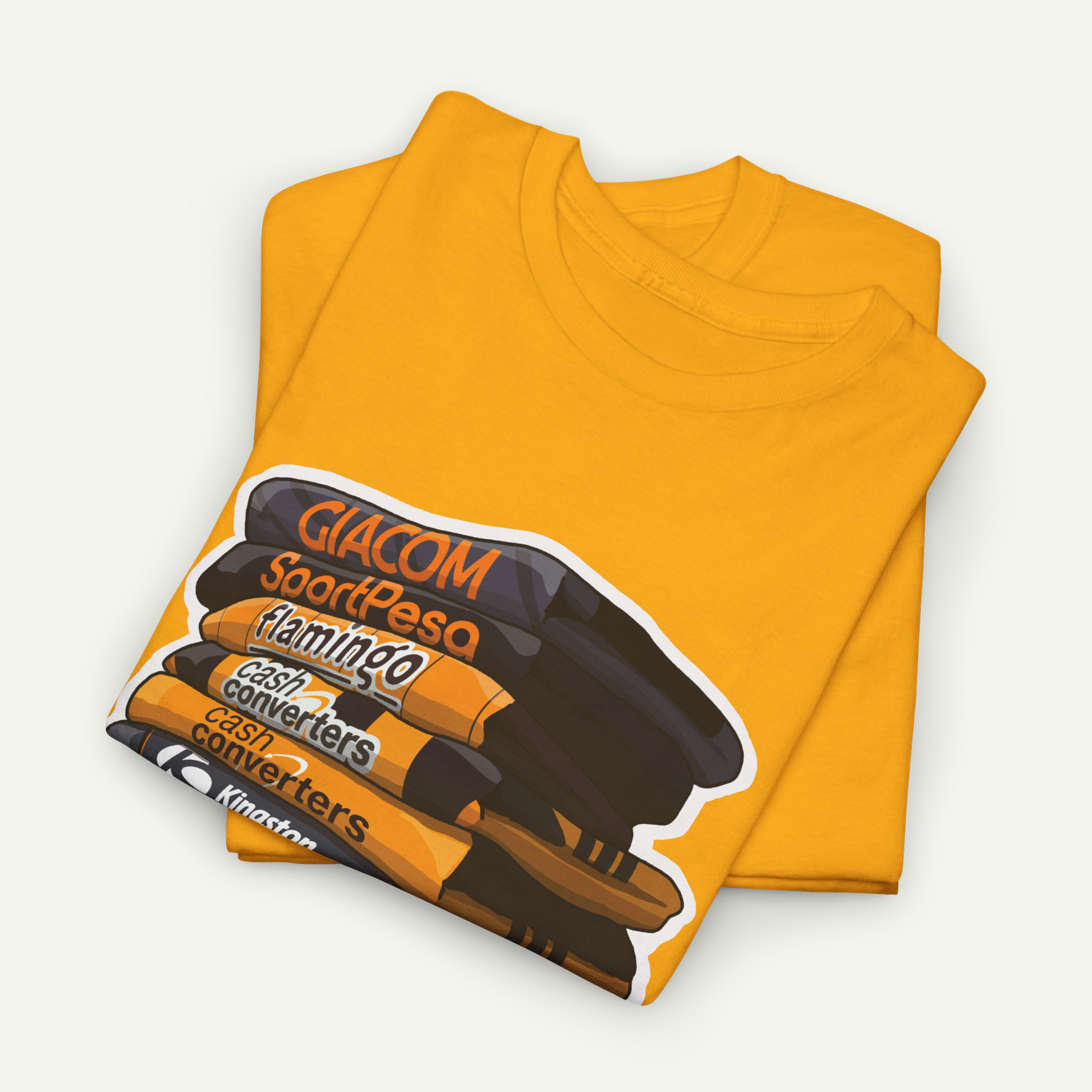 a yellow t-shirt with a graphic design featuring a stack of various objects, including a flamingo, cash converters, and a stack of books.