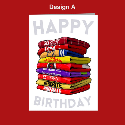A stack of colorful towels with the text "Happy Birthday" written on them.