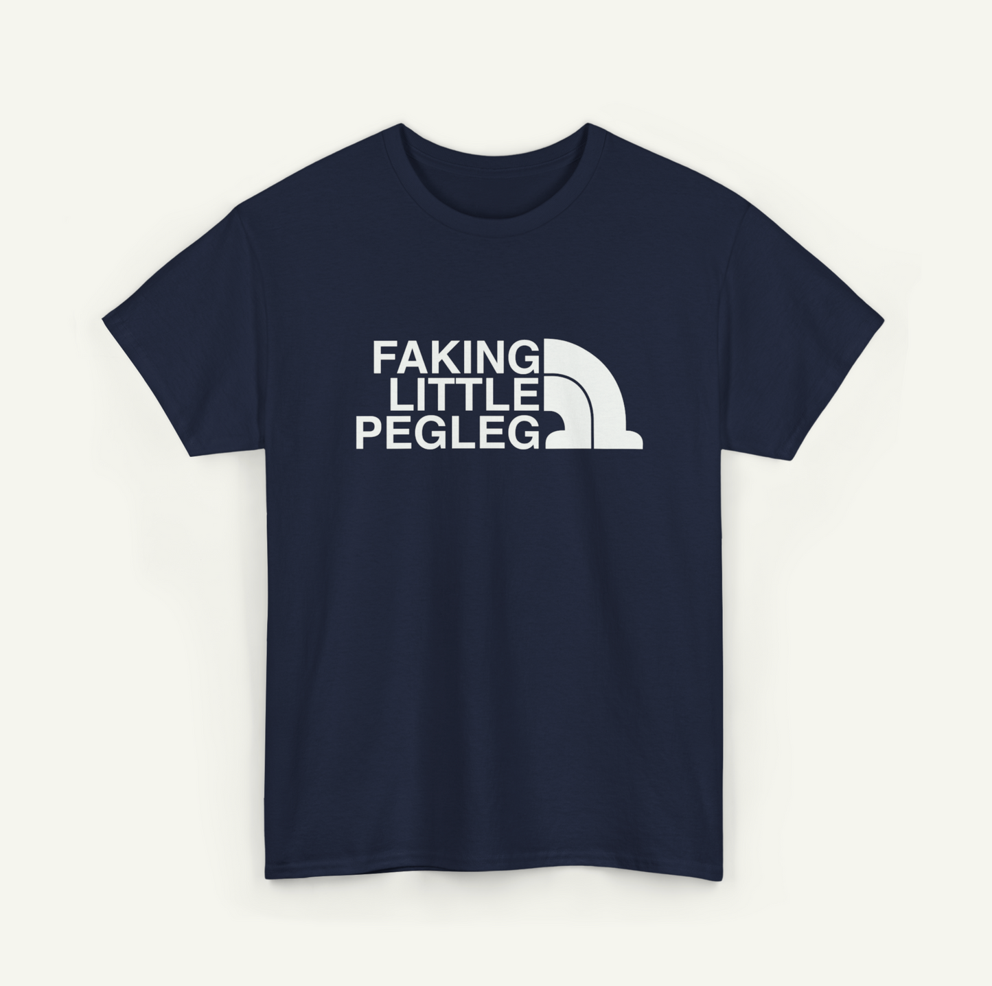 A navy blue t-shirt with the text "FAKING LITTLE PEGLEG" printed on it in white.