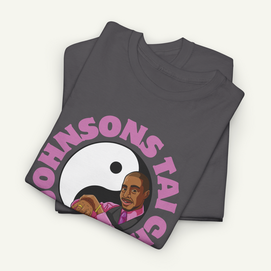 a gray t-shirt with a graphic design featuring a man's face and the text "OHNSON'S TAI" in pink.
