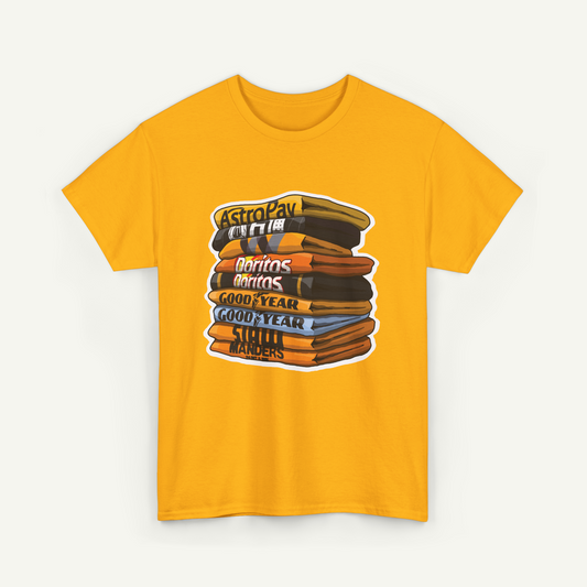 A yellow t-shirt with a graphic design depicting a stack of books or magazines with various text on the covers.