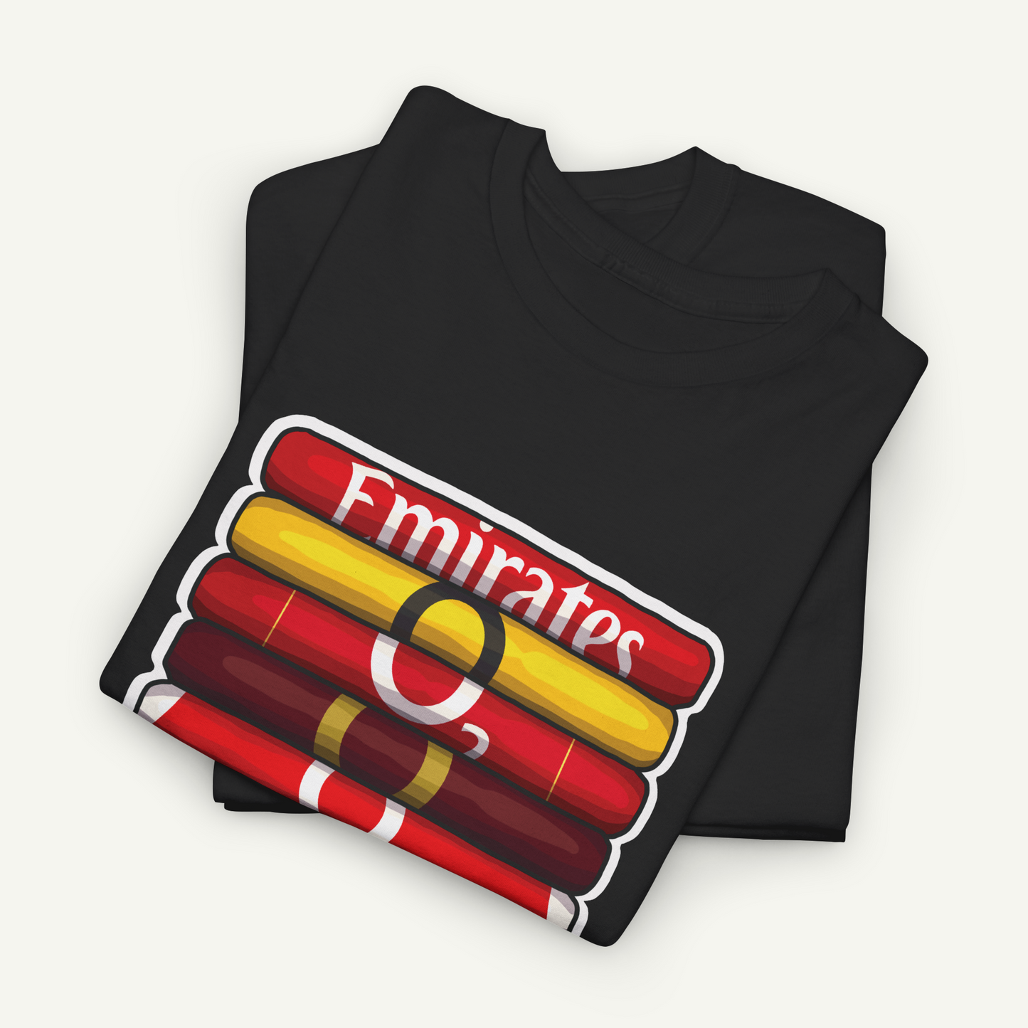 A black t-shirt with a graphic design featuring a stack of colorful tubes or cylinders, with the word "Emirates" written on the side.