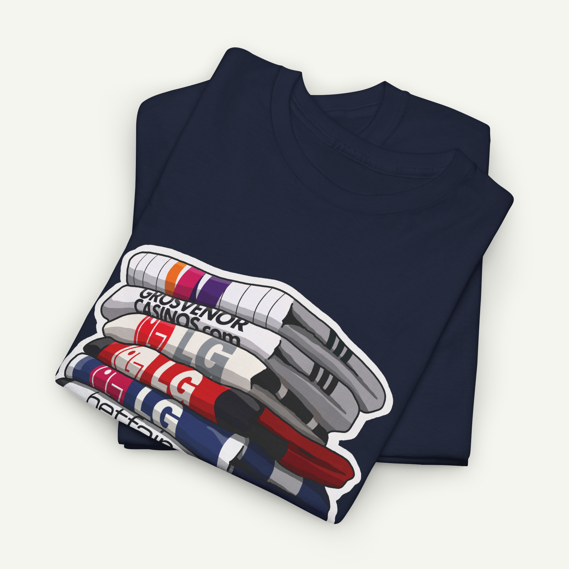 A navy blue t-shirt with a graphic design depicting a stack of colorful markers or pens.