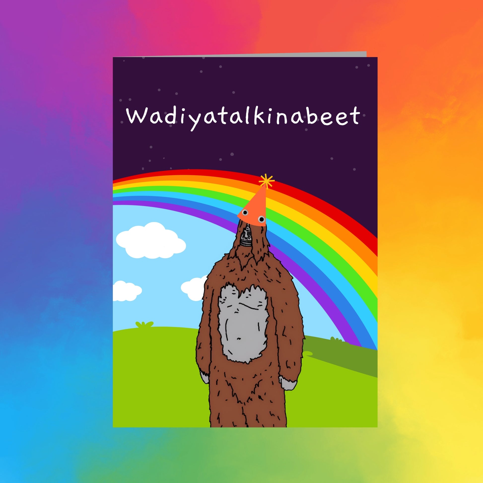 A cartoon image of a brown bear wearing a party hat, standing in a grassy field with a rainbow in the background.