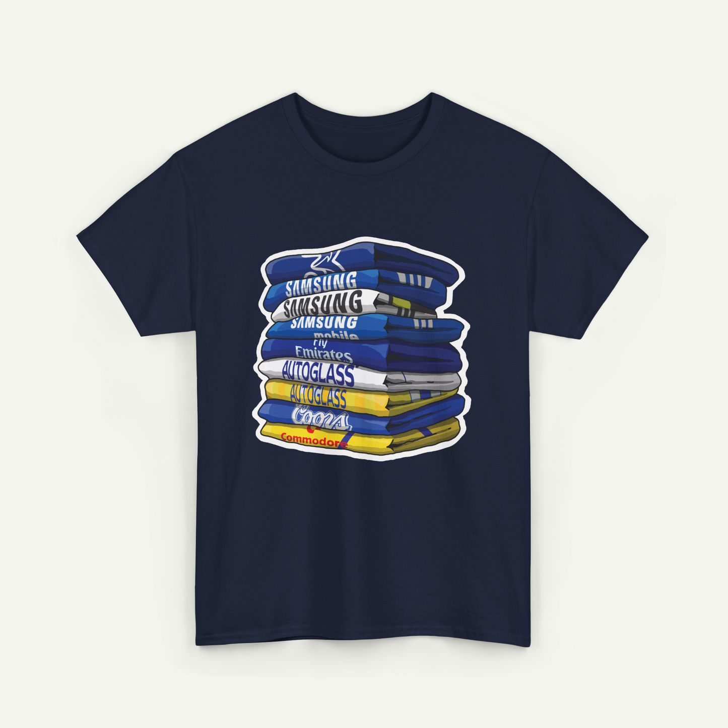 A navy blue t-shirt with a graphic design depicting a stack of books or magazines with the text "Samsung", "Comcast", and "Autoglass" printed on them.