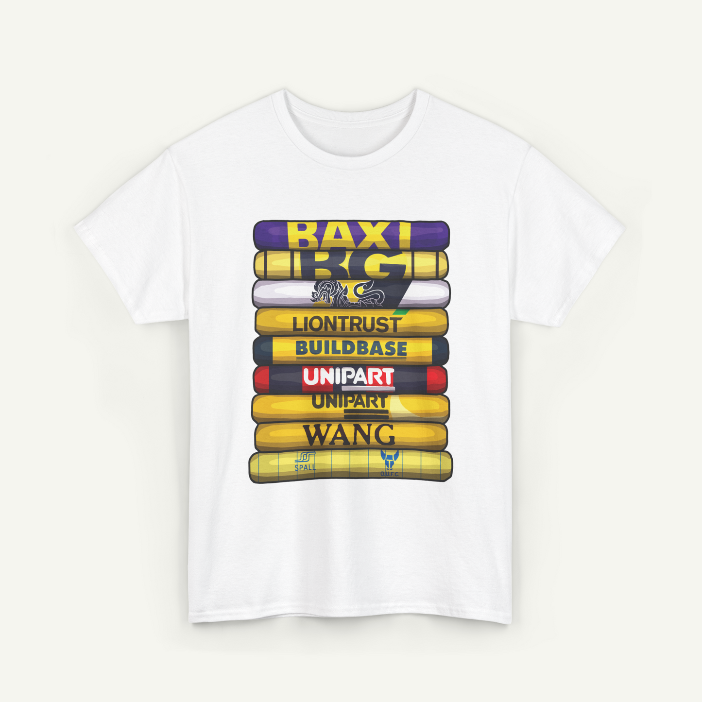 A white t-shirt with a graphic design featuring a stack of yellow and purple books with various text and logos printed on them.