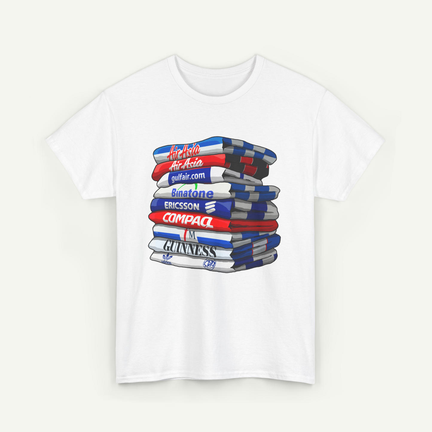 A white t-shirt with a graphic design depicting a stack of books or magazines with various text and logos on the covers.