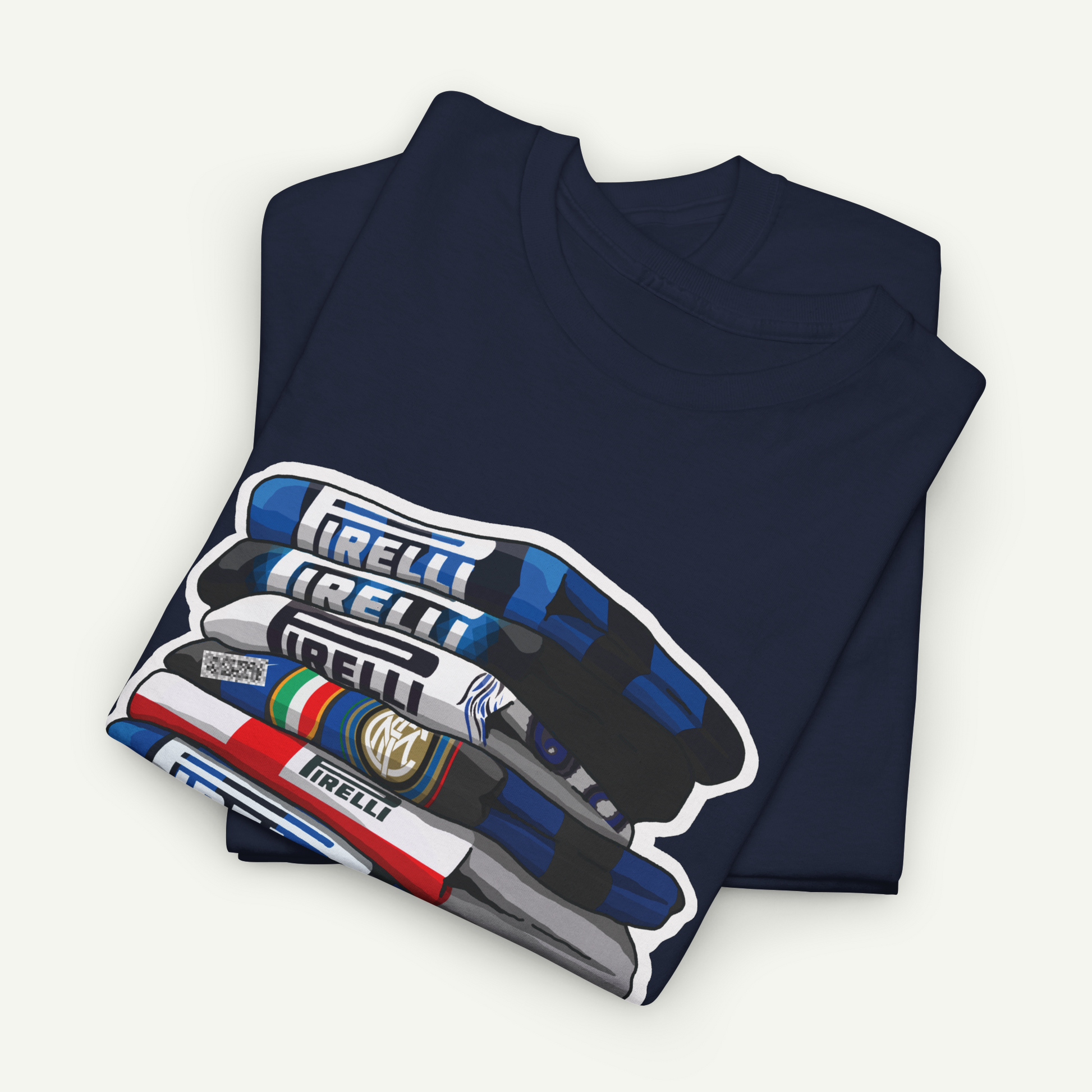 A dark blue t-shirt with a graphic design depicting a stack of blue and white IRELLI pens.