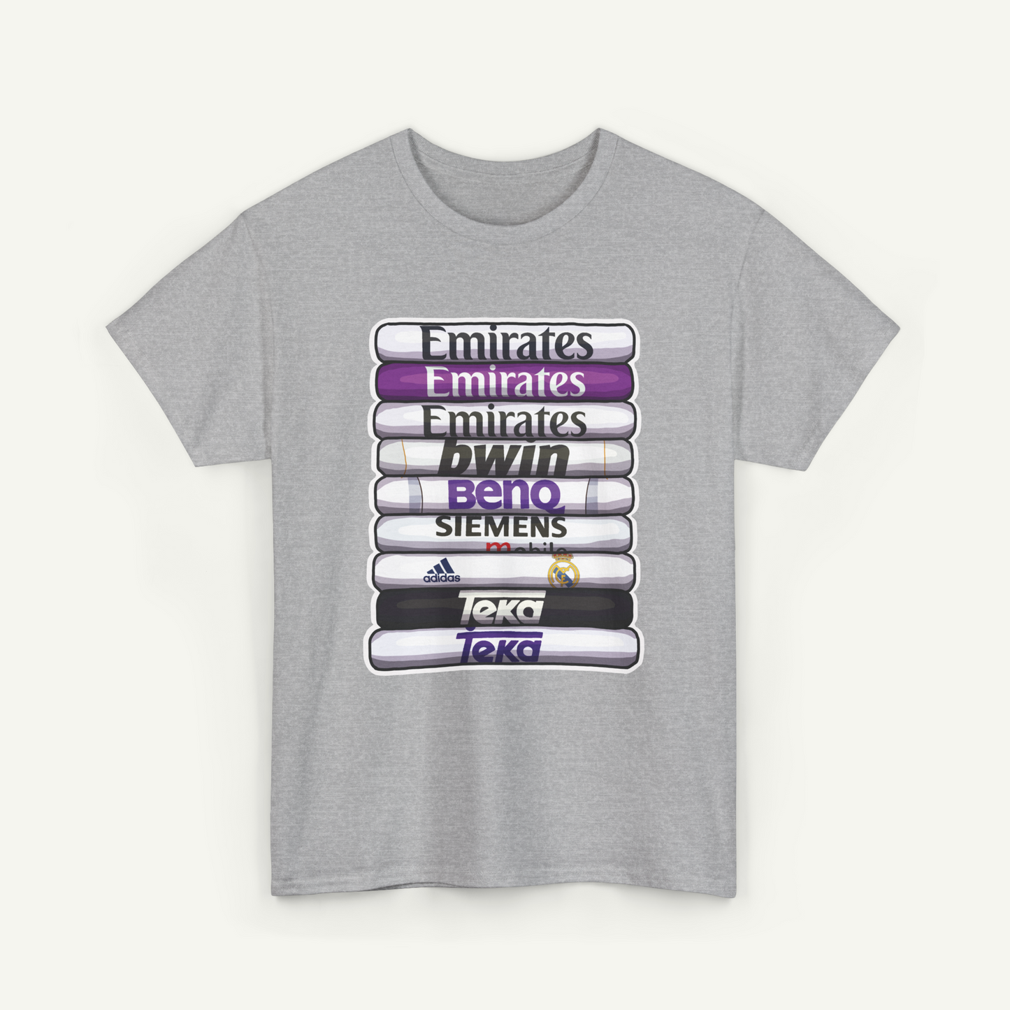 A gray t-shirt with a graphic design featuring a stack of various logos and text.