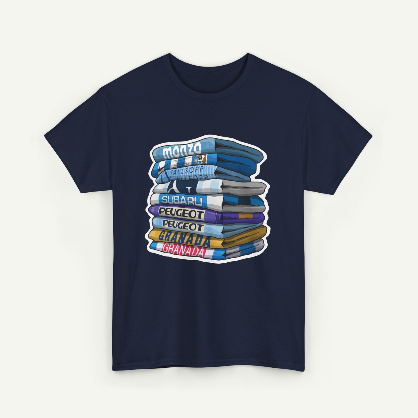 A navy blue t-shirt with a graphic design depicting a stack of books with various colored covers, including blue, white, and yellow.