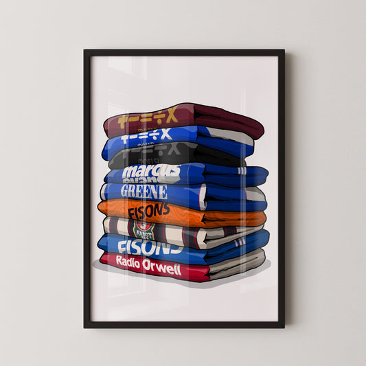 A framed illustration of a stack of colorful books or magazines with various titles and authors' names on the spines.