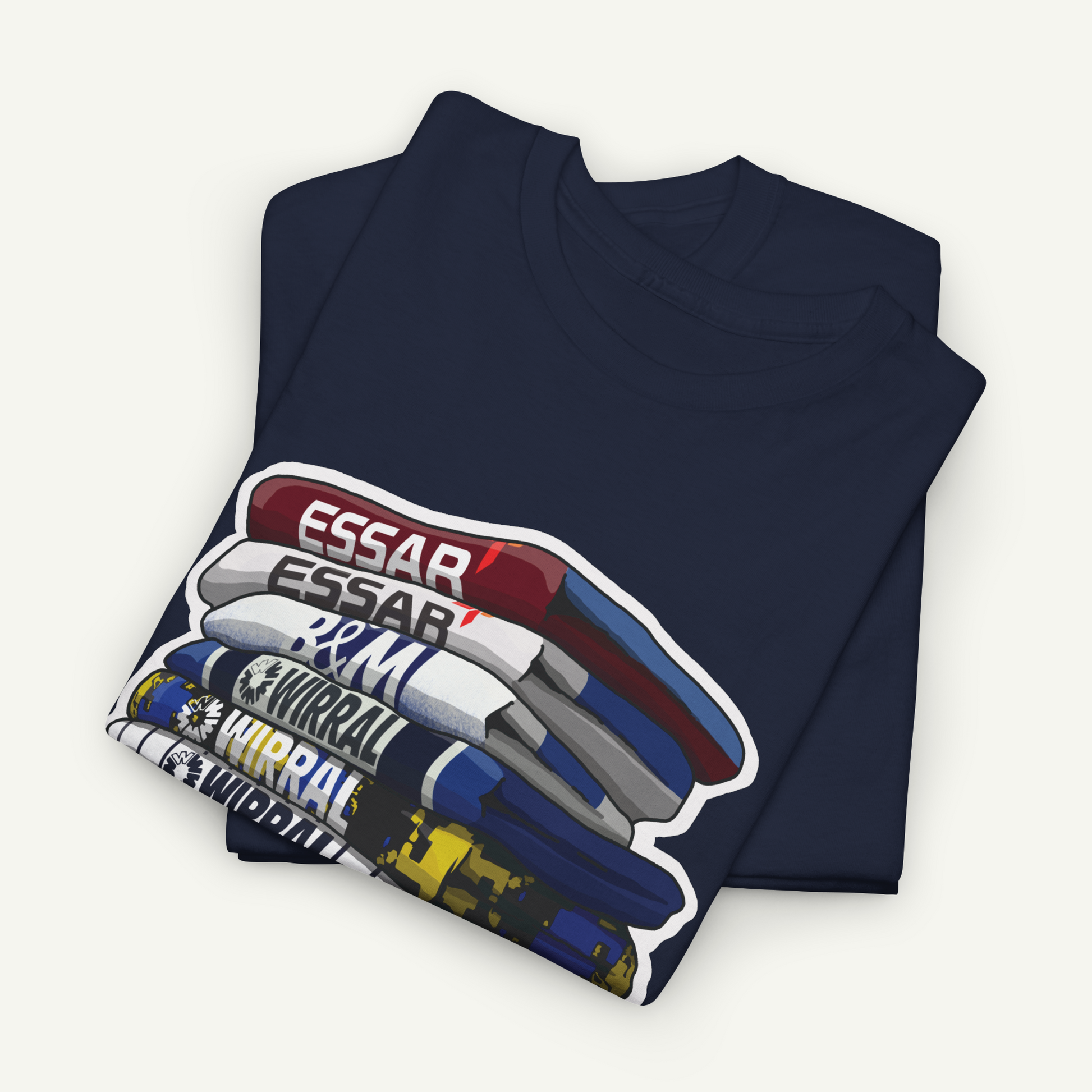 A navy blue t-shirt with a graphic design depicting a stack of books or magazines with the text "ESSAR" printed on them.