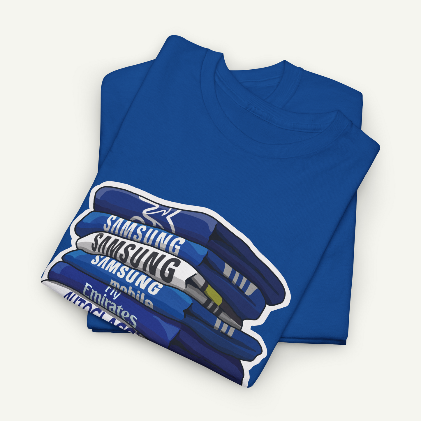 A blue t-shirt with a graphic design depicting a stack of blue and white Samsung mobile devices.