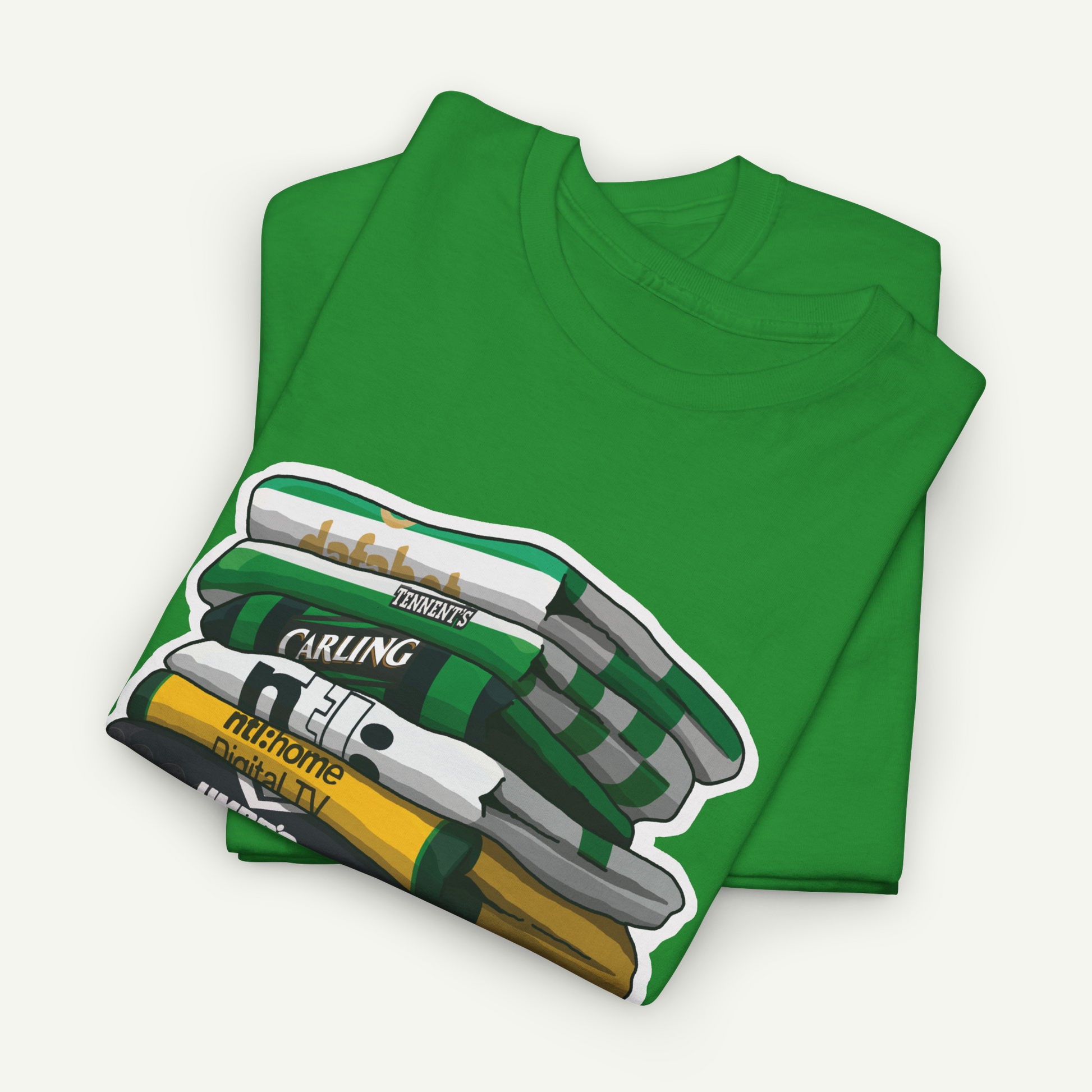 A green t-shirt with a graphic design depicting a stack of books.