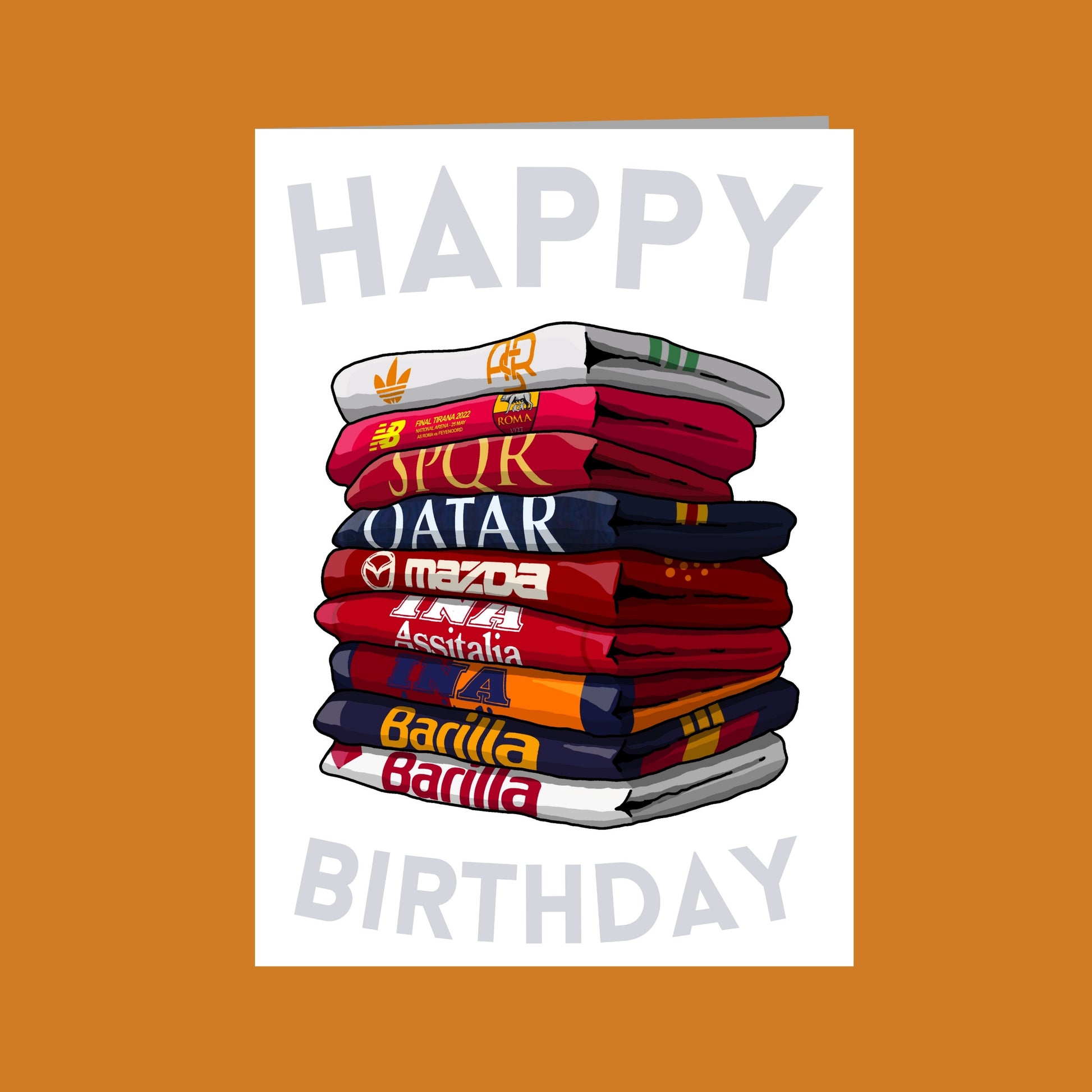 A stack of colorful towels with various logos and text, including "SPORT", "QATAR", "MAZDA", "ASSINIA", "Barilla", and "BARILLA". The text "HAPPY BIRTHDAY" is displayed at the top of the image.
