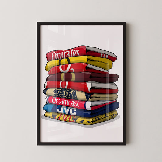 A framed illustration of a stack of colorful pillows with various logos and text on them.