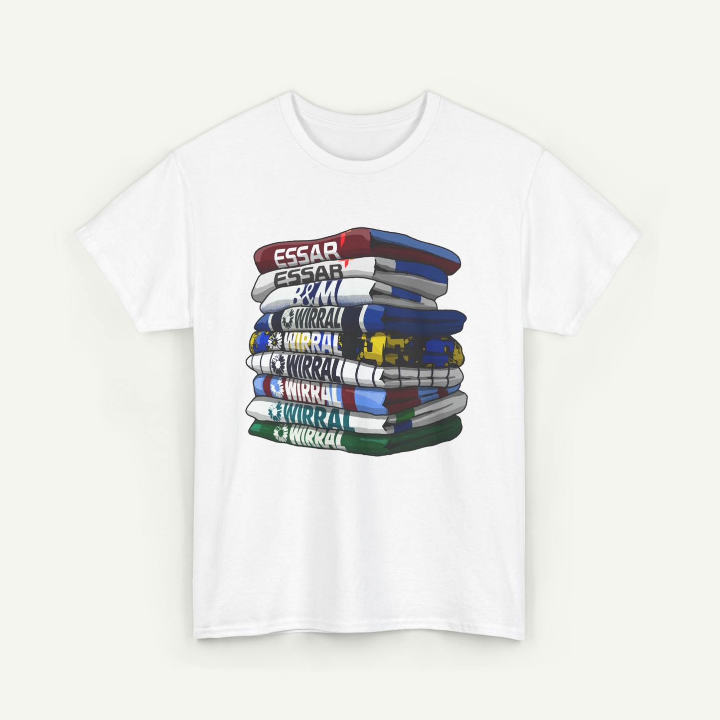 A white t-shirt with a graphic design depicting a stack of colorful books or magazines.