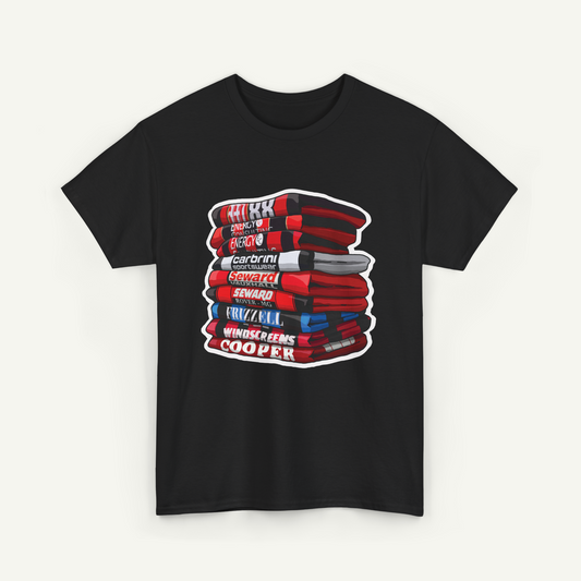 A black t-shirt with a graphic design depicting a stack of books with various titles and authors' names.