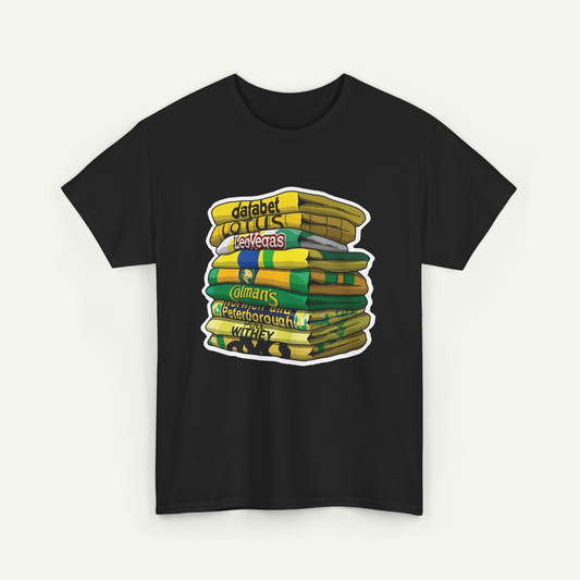 A black t-shirt with a graphic design depicting a stack of colorful books or magazines.