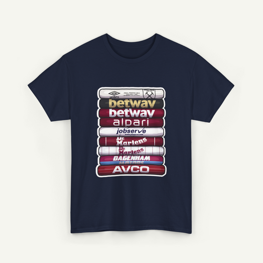A navy blue t-shirt with a graphic design featuring a stack of books with various logos and text on the spines.
