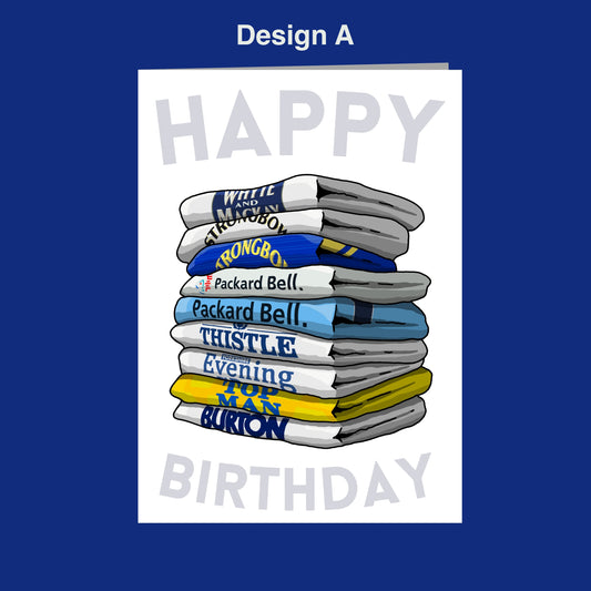 A stack of folded towels with various text printed on them, representing a birthday gift.