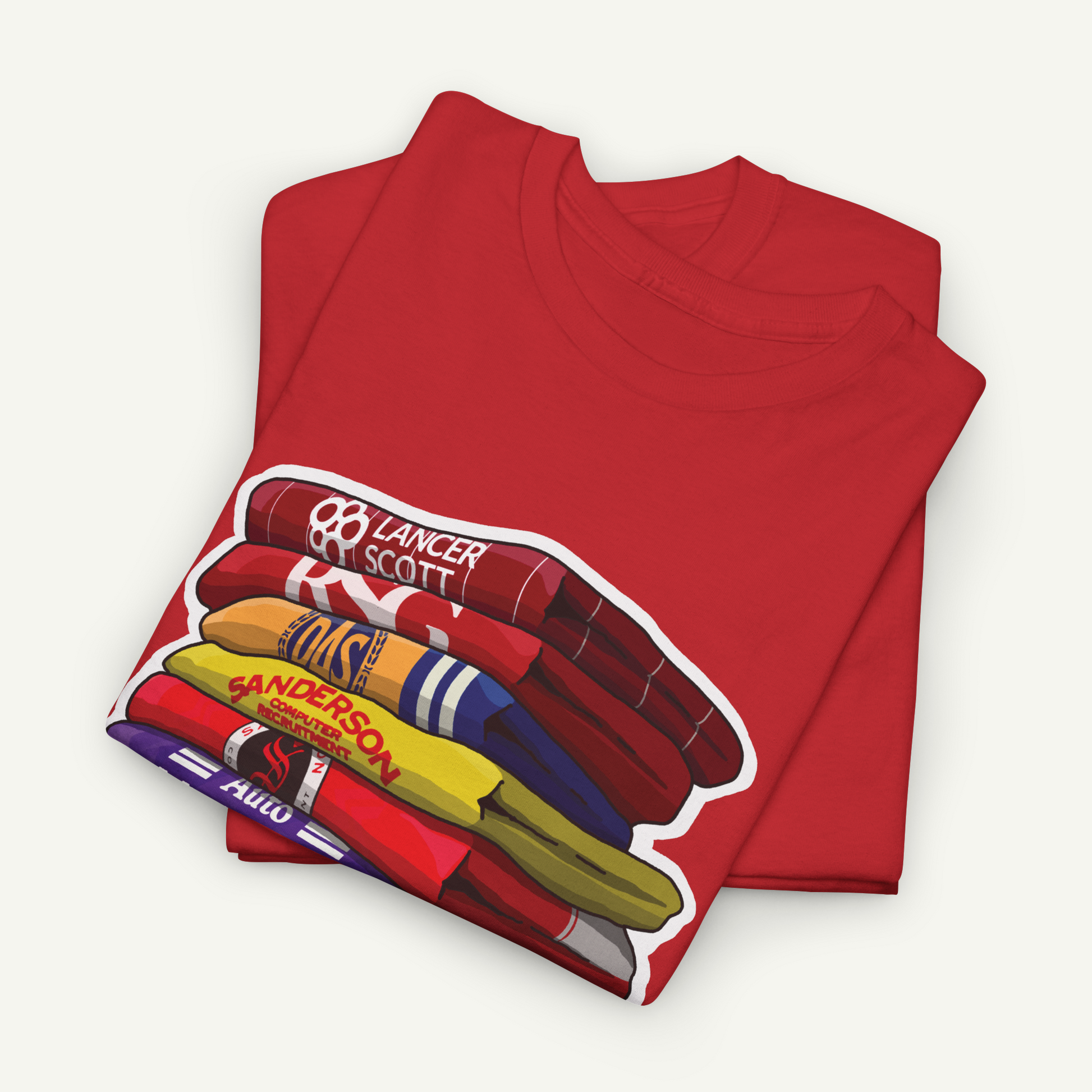 A red t-shirt with a graphic design depicting a stack of colorful objects, including a red and yellow striped object, a red and blue striped object, and a red and yellow striped object.