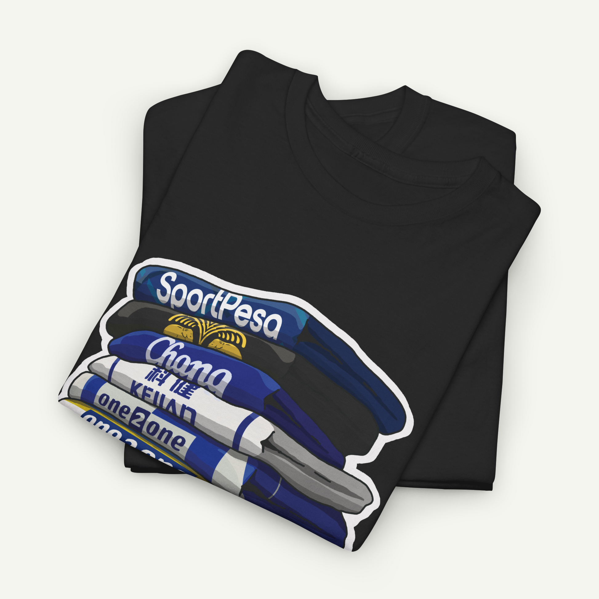 A black t-shirt with a graphic design depicting a stack of books or a stack of blue and white items.