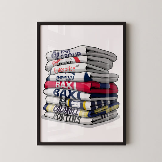 A framed illustration of a stack of various colored towels, each with a different logo or text on them.