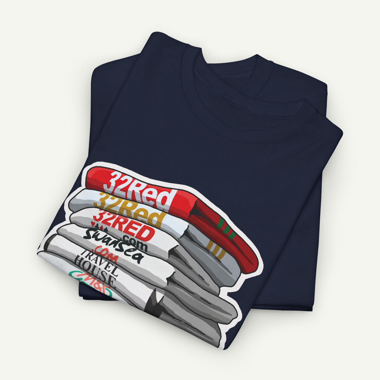 A navy blue t-shirt with a graphic design depicting a stack of colored pencils in various shades of red, white, and gray.