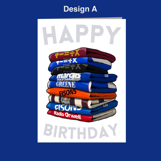 a birthday card with a stack of books