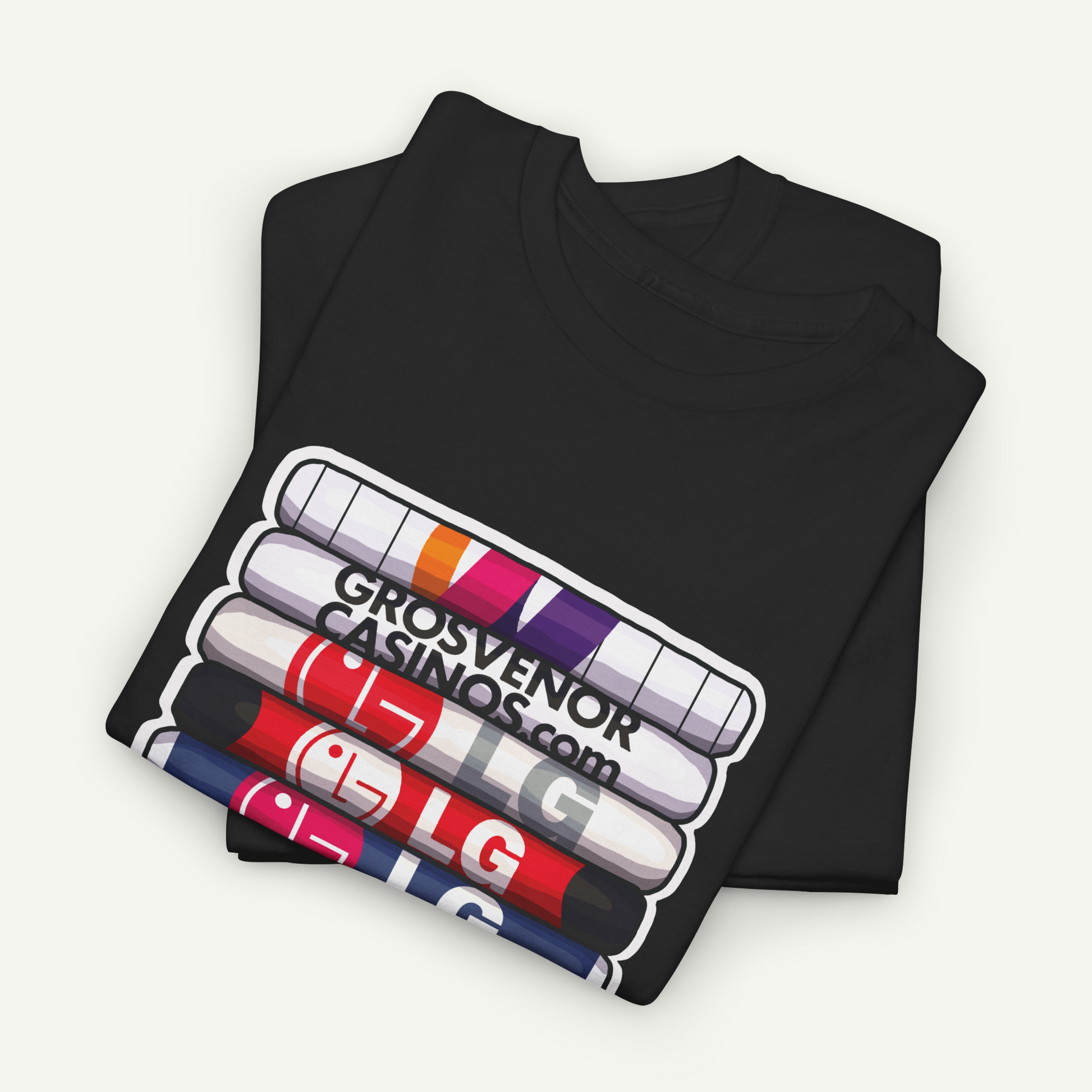 A black t-shirt with a graphic design featuring a stack of colorful blocks with the text "GROSVENOR CASINO.COM" printed on them.