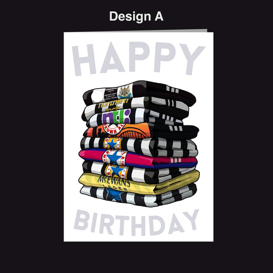 A stack of colorful towels with the text "Happy Birthday" written on them.