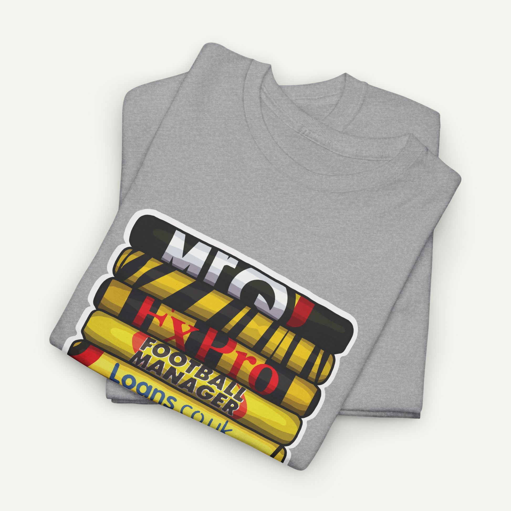 A gray t-shirt with a graphic design depicting a stack of books or magazines with the text "M.C.I.L.O.F.P.O.L.O.G.L.O.N.C.K." printed on it.