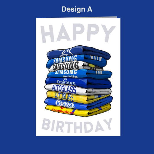 A stack of folded blue and yellow towels with the text "Happy Birthday" written on them, set against a blue background.