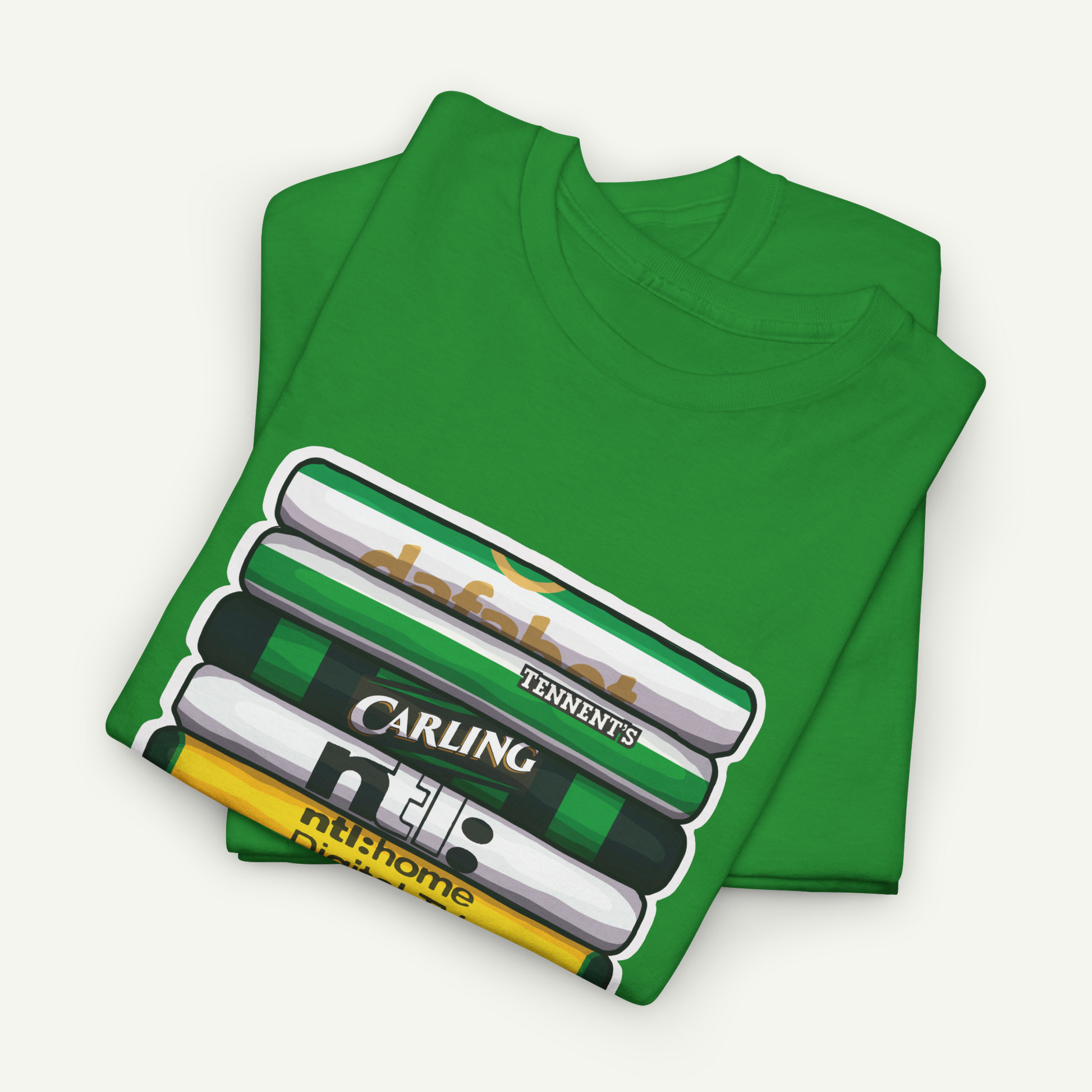 A green t-shirt with a graphic design depicting a stack of books or magazines.